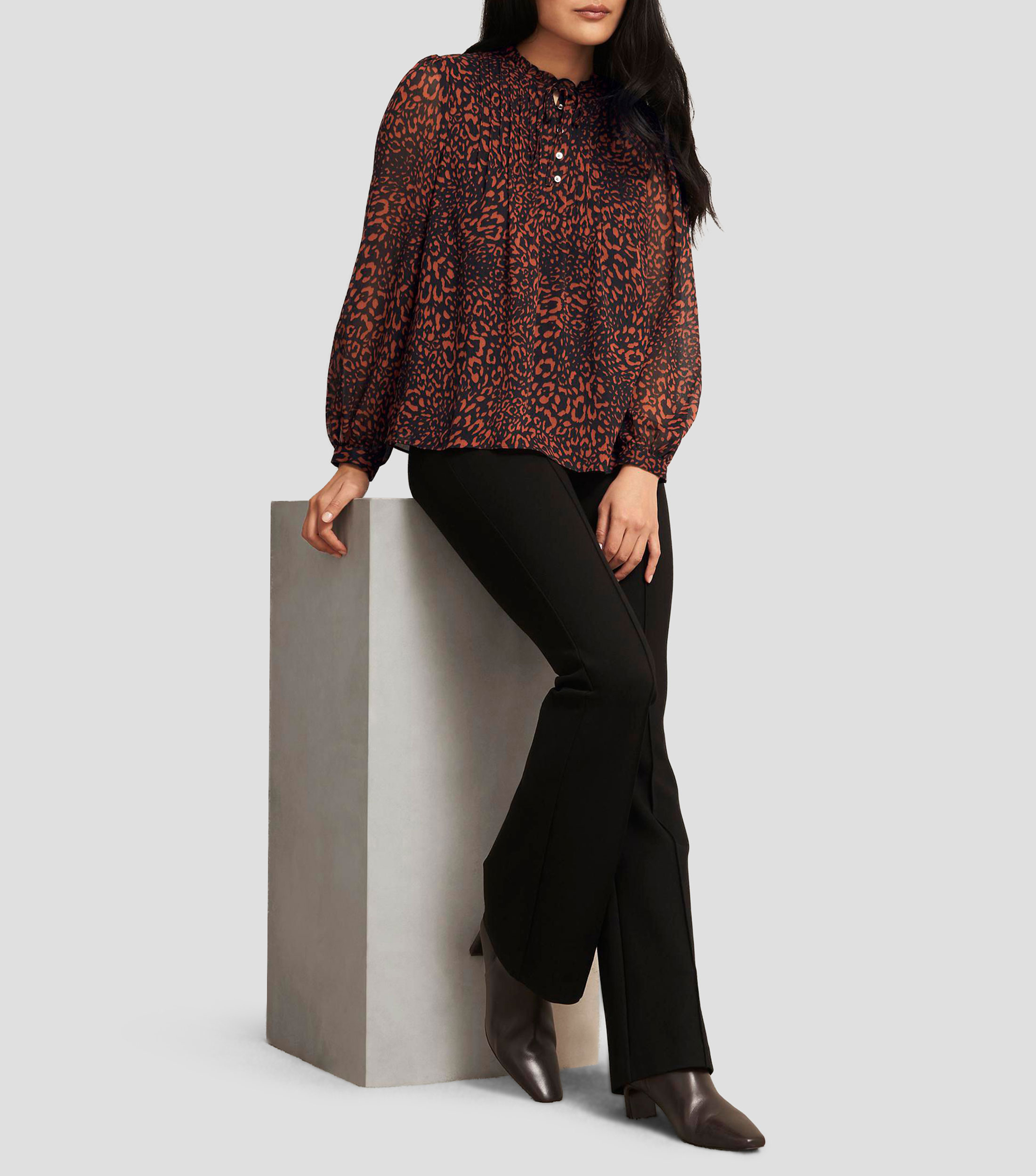 Blusa animalprint manga larga Mujer